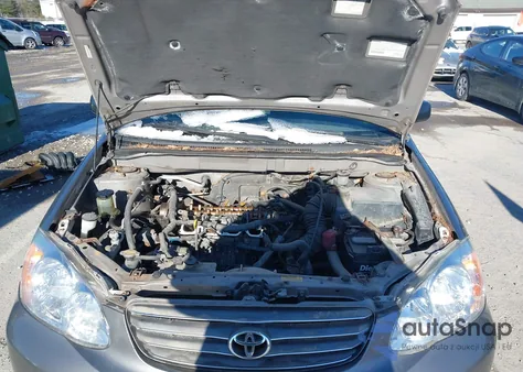 2003 Toyota Corolla Ce z USA, uszkodzony, nr VIN 2T1BR32E13C065992